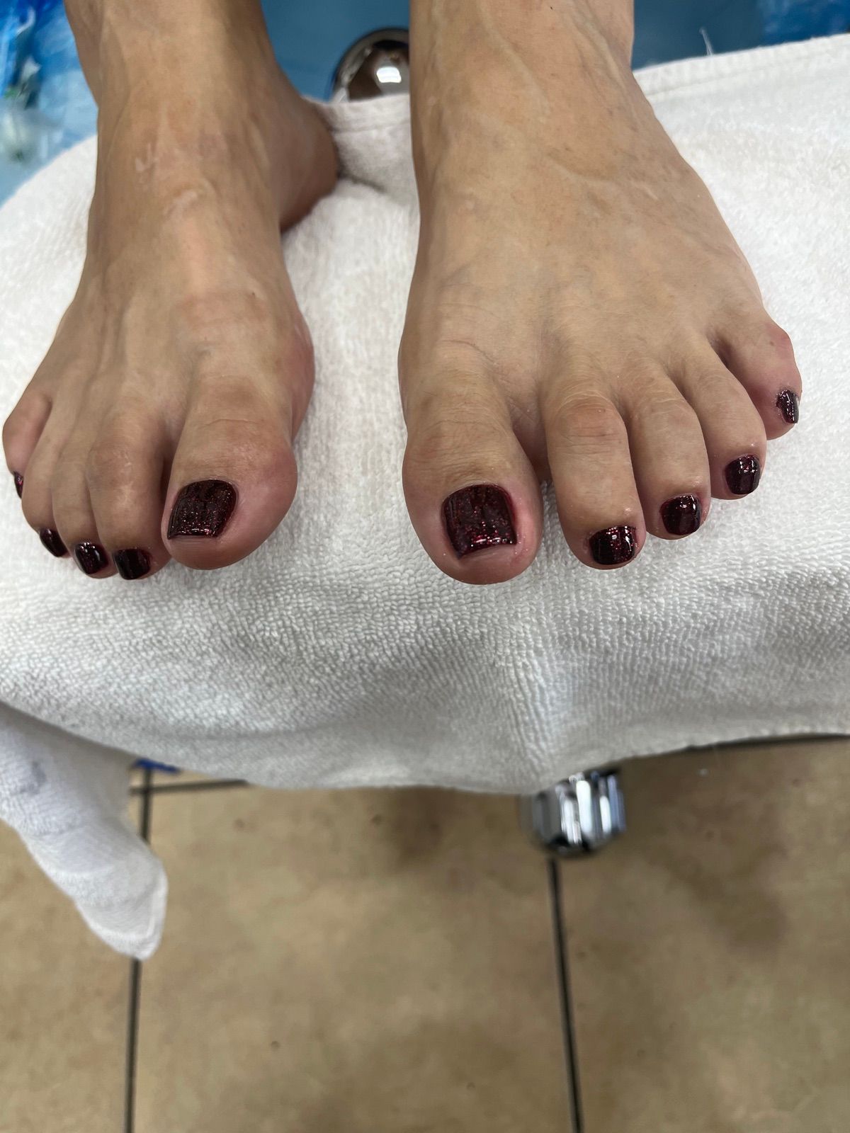 Dark burgundy pedicure