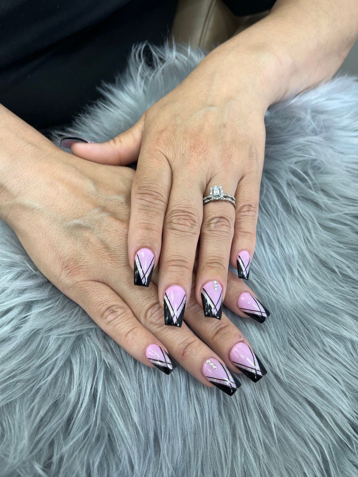 Lilac square nails with black and white V French tips