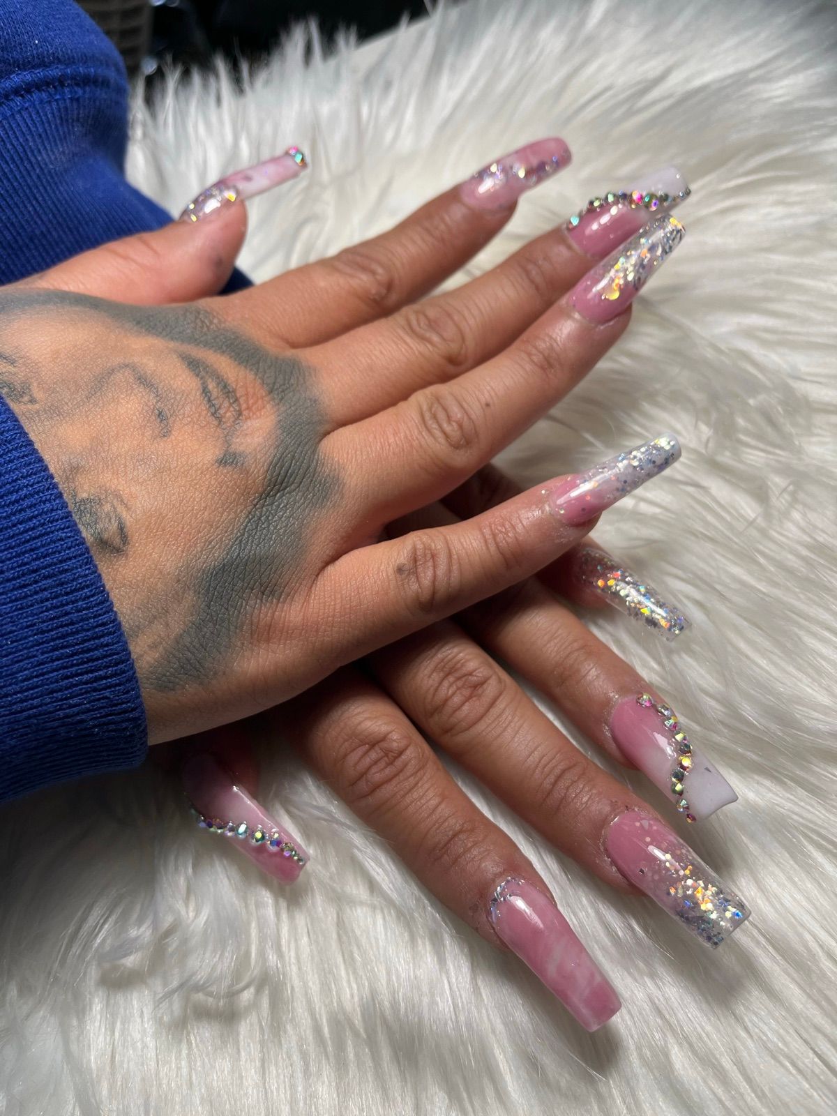 Extra-long pink marble coffin nails with silver glitter and rhinestones