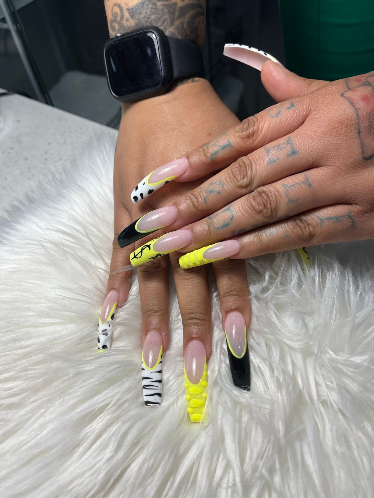 Long coffin nails with neon yellow French tips and zebra print