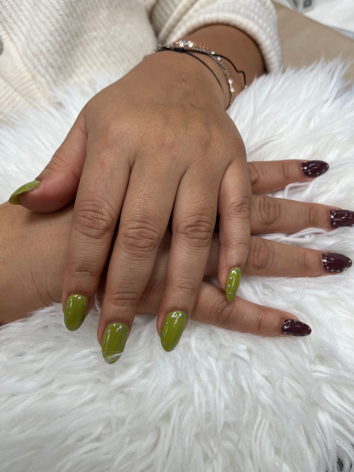 Olive green and burgundy glitter almond nails